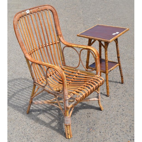 128 - An early 20th century Bamboo conservatory chair and a similar bamboo side table in the manner of Lib... 