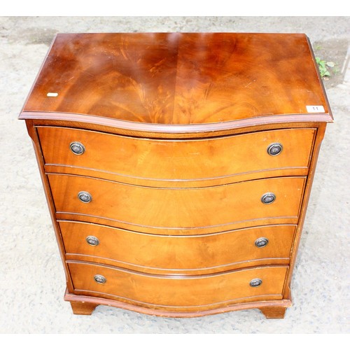 11 - A Regency style bow fronted 4 drawer chest of drawers