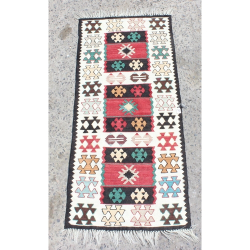 201 - A colourful Kilim runner rug