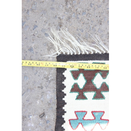 201 - A colourful Kilim runner rug