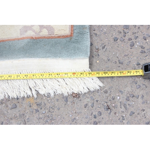 213 - A large Chinese thick pile rug
