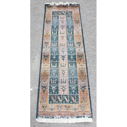 218 - A modern Gabbeh runner rug, decorated with birds