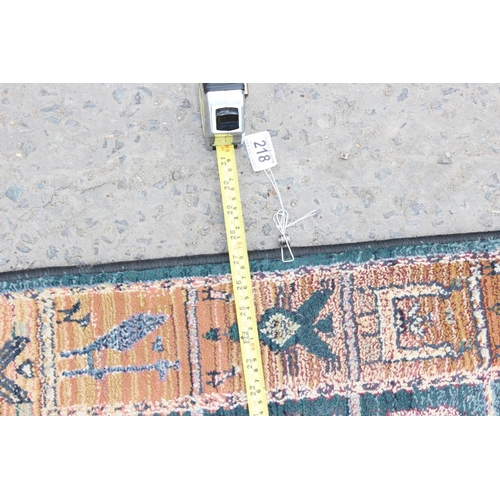 218 - A modern Gabbeh runner rug, decorated with birds