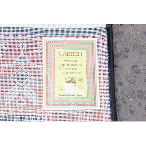218 - A modern Gabbeh runner rug, decorated with birds