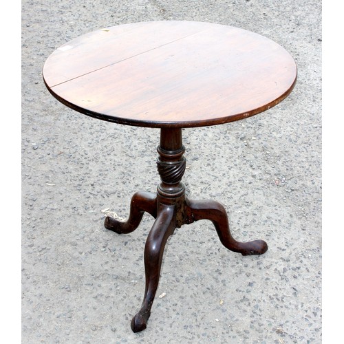 9 - A 19th century Mahogany tripod table with carved base