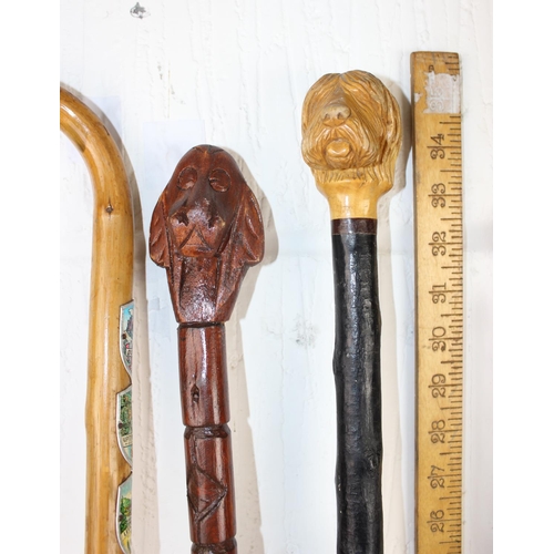 1606 - 6 assorted walking sticks to inc one with carved dogs head