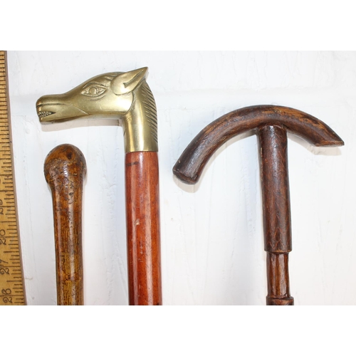 1606 - 6 assorted walking sticks to inc one with carved dogs head