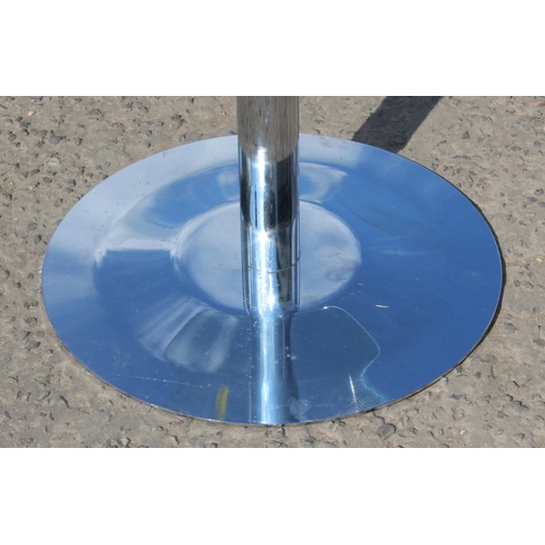 11 - Glass topped round table with polished metal base