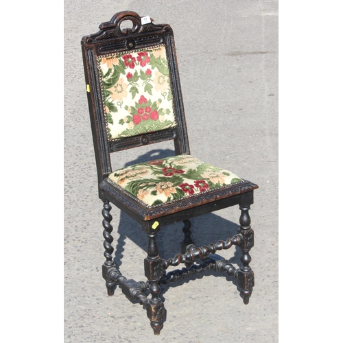 17 - Antique Jacobean style oak chair with stuffed seat