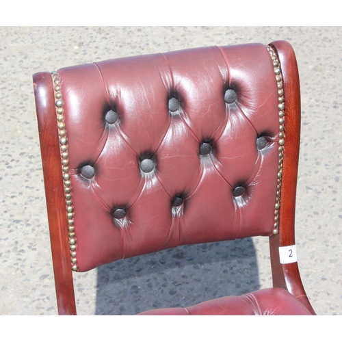 2 - Single chair in Ox Blood red leather with Chesterfield button back and seat