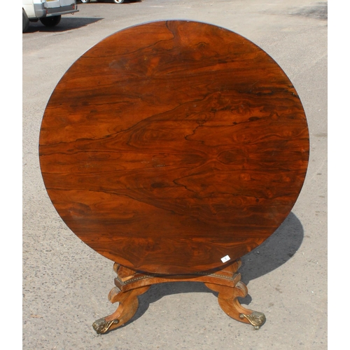 3 - A 19th century Rosewood folding breakfast table with gilt metal mounts to base