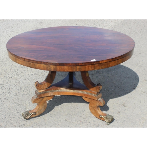 3 - A 19th century Rosewood folding breakfast table with gilt metal mounts to base