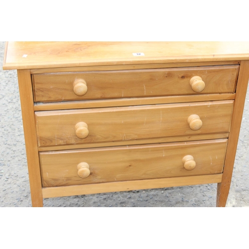 32 - A modern pine 3 drawer dressing table with mirror