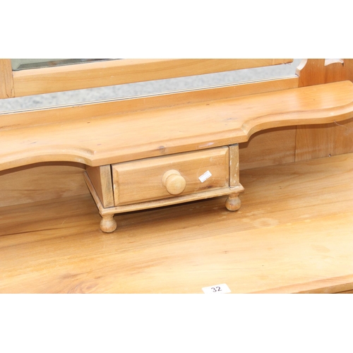 32 - A modern pine 3 drawer dressing table with mirror