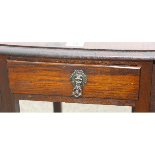 35 - 1930's oak drop leaf table with drawer