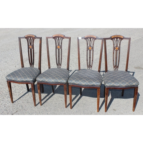 4 - A set of 4 antique dining chairs with stuffed seats and inlaid backs