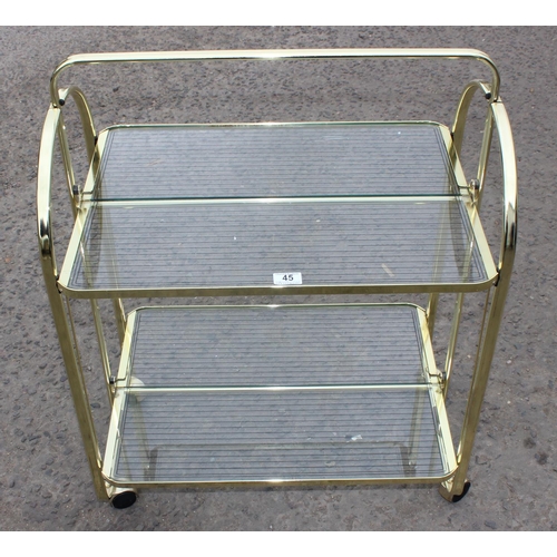 45 - A retro folding glass and gold finished serving trolley