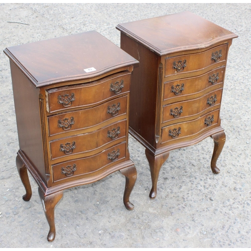 49 - A pair of Georgian style 4 drawer chests of drawers standing on cabriole legs