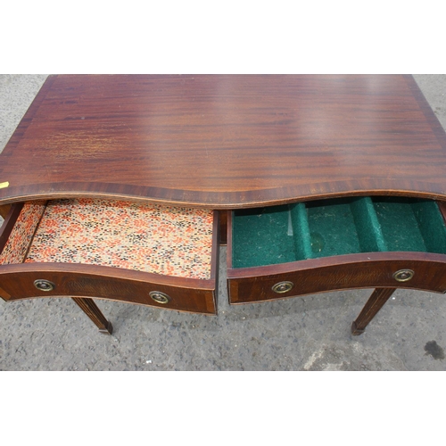 7 - A Georgian style Mahogany hall table with 2 drawers and glass top