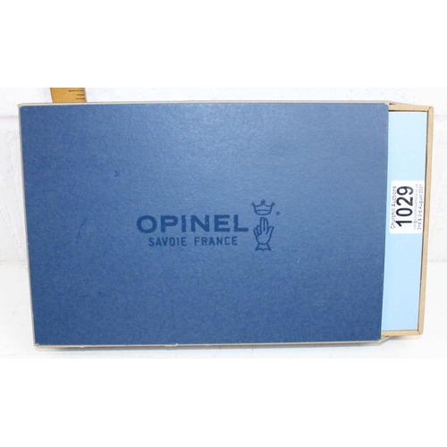 1029 - A boxed set of Opinel steak knives