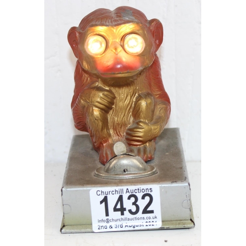 1432 - An unusual vintage monkey toy with light up eyes