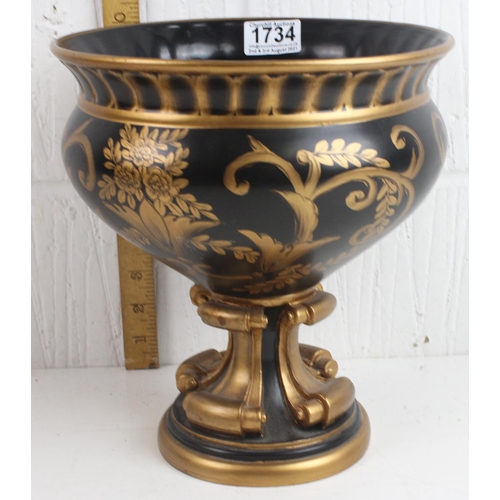 1734 - A large black and gilt decorative vase or urn in the classical style