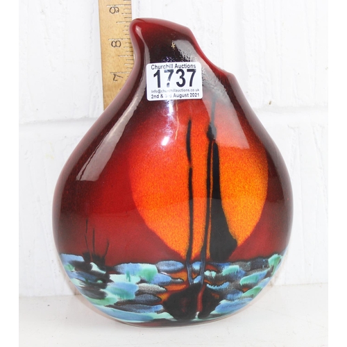 1737 - Anita Harris studio pottery vase in the manner of Poole decorated with a ship at sunset