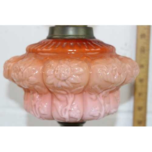 243 - An impressive antique oil lamps with graduated coral coloured reservoir, Eltex burner and etched gla... 