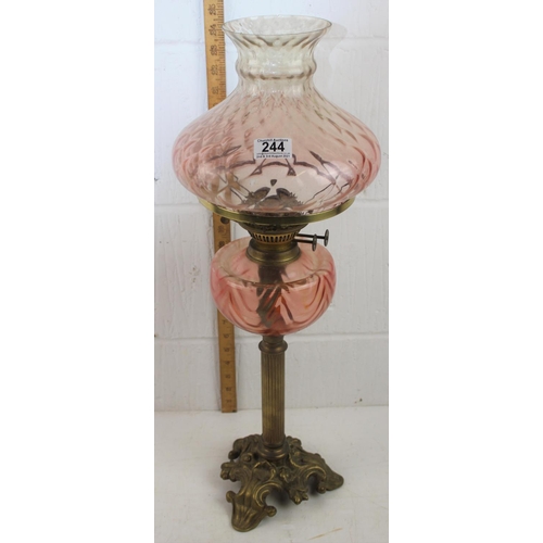 244 - Victorian oil lamp with pink glass shade