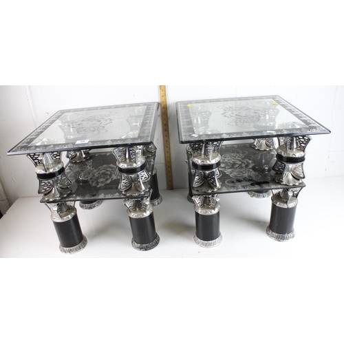 56 - A pair of chrome and black decorative tables with glass tops