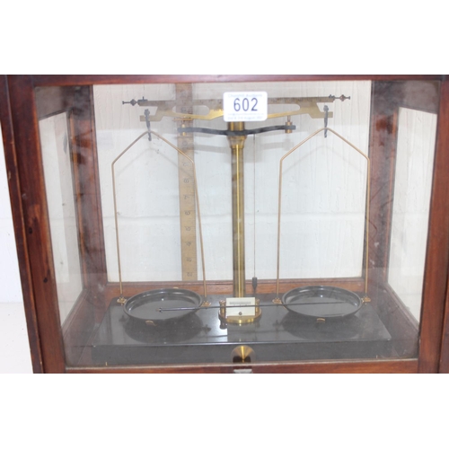 602 - A set of vintage cased laboratory scales