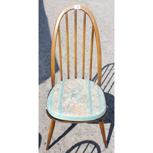 74 - A set of 4 Ercol hoop back dining chairs with cushions