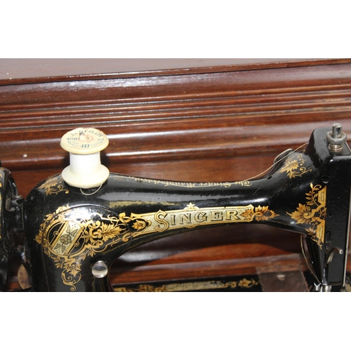 769 - Antique wooden cased Singer sewing machine