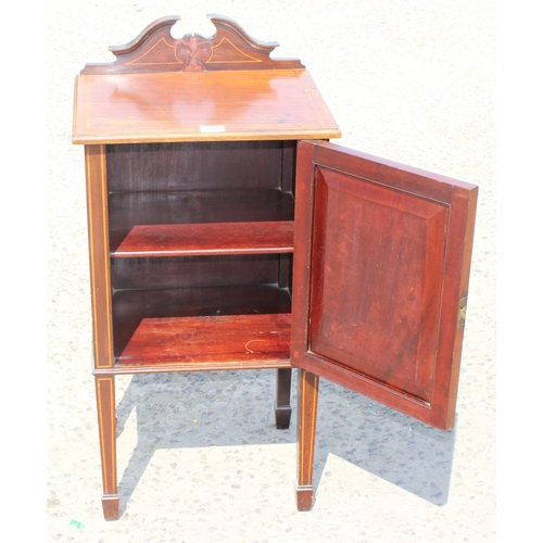 102 - Edwardian mahogany bedside cabinet with tulip wood inlay to top and door