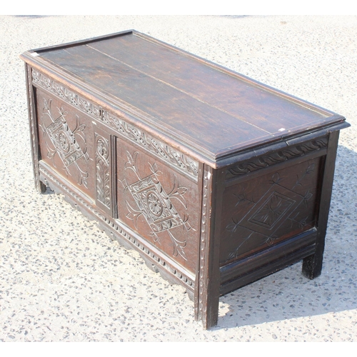 121 - Antique carved oak coffer