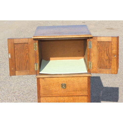 128 - Antique Arts & Crafts period oak cabinet with 4 drawers under a small cabinet