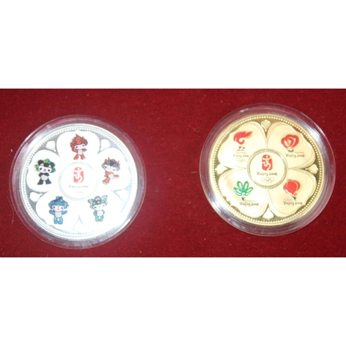 1307 - Beijing 2008 Olympic twin silver/gold plated and enamelled medallions in fitted case with certificat... 