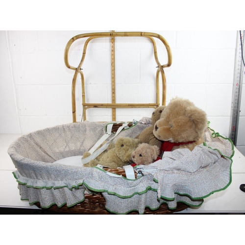 1467 - Vintage wicker cot on stand containing vintage teddy bears