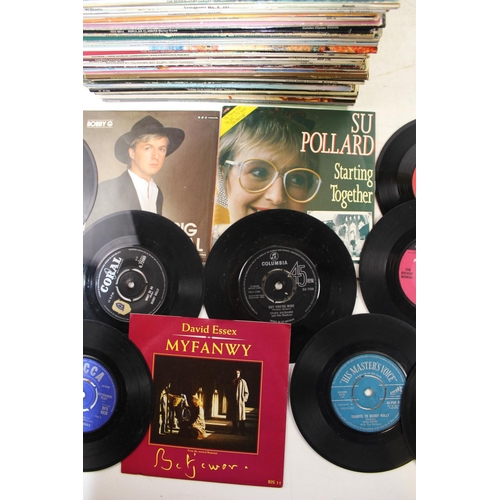 560 - Large qty of assorted LP and 7