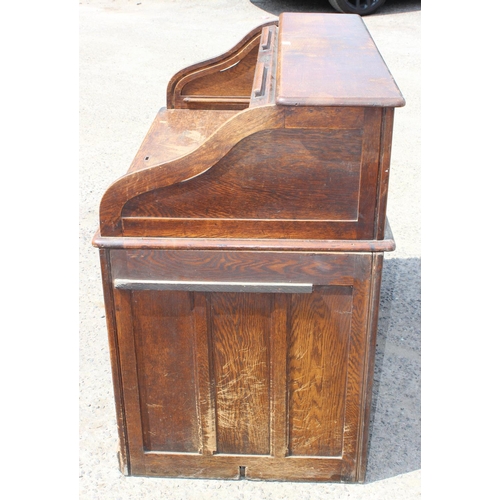 144 - Early 20th century Oak roll-top desk