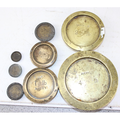 622 - A set of antique brass balance scales by Bartlett of Bristol and various brass Avery weights etc