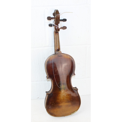 570 - An early 20th century violin stamped Stainer in case