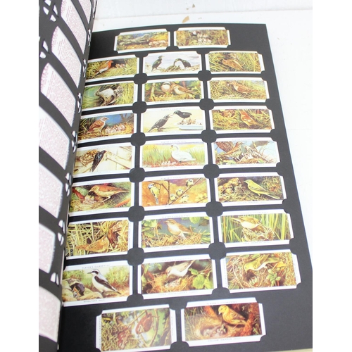 1563 - 3 folders of Card Collectors society reproduction cigarette cards