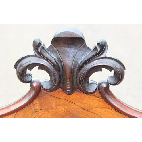 148 - A Victorian Rosewood Credenza cabinet with carved back and 2 symmetrical shelving units