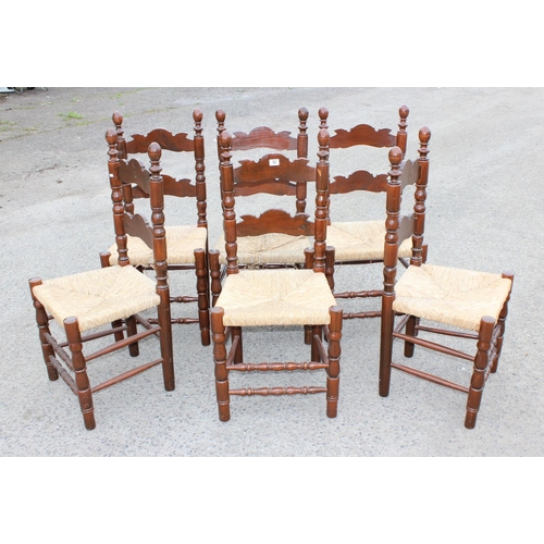 152 - A set of 6 country dining chairs with rush seats