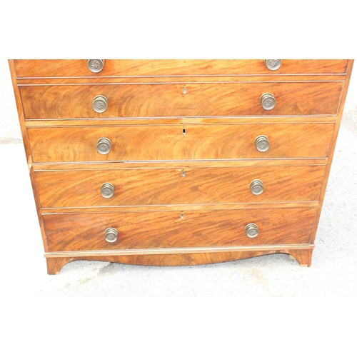 167 - A George III mahogany Secretaire bookcase, with astragal glazed doors above 5 drawers, the top 2 fit... 