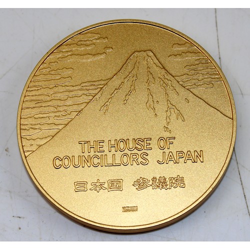 1301 - Unusual gilt bronze medallion - The House of Councillors, Japan