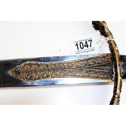 1047 - A 20th century double edged sword with double eagle cast brass handle