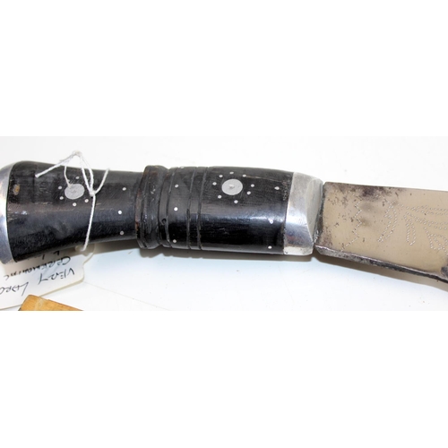 1048 - An unusually large Kukri knife in leather sheath - blade length approximately 71cm