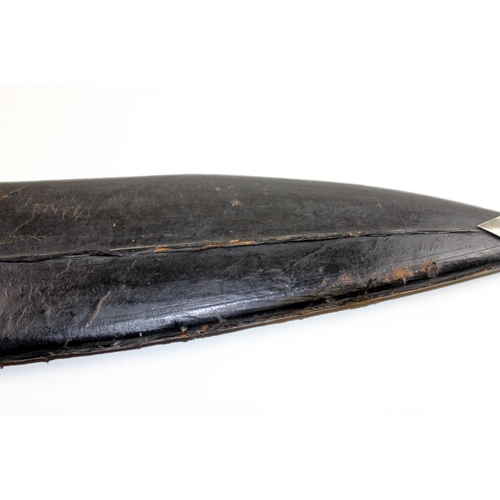 1048 - An unusually large Kukri knife in leather sheath - blade length approximately 71cm